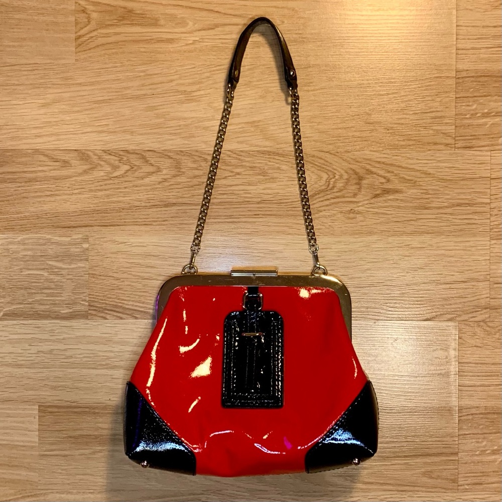 Kate Spade NY shoulder bag with gold hardware clasp red vermilion color way